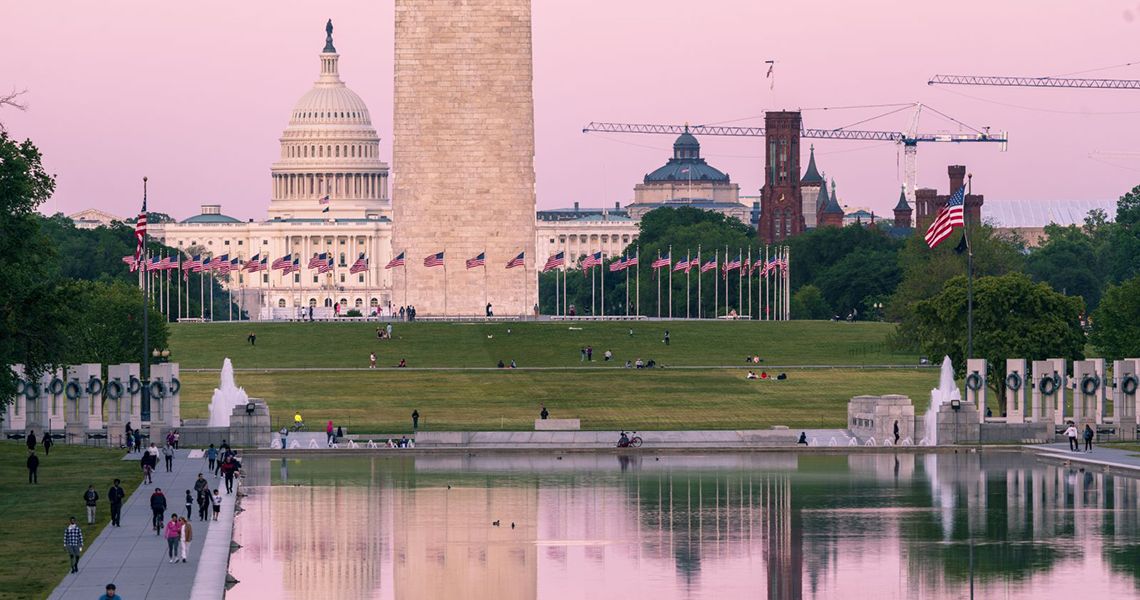 Washington DC with the reflecting pool, part of the washington monument, and the capitol building in view